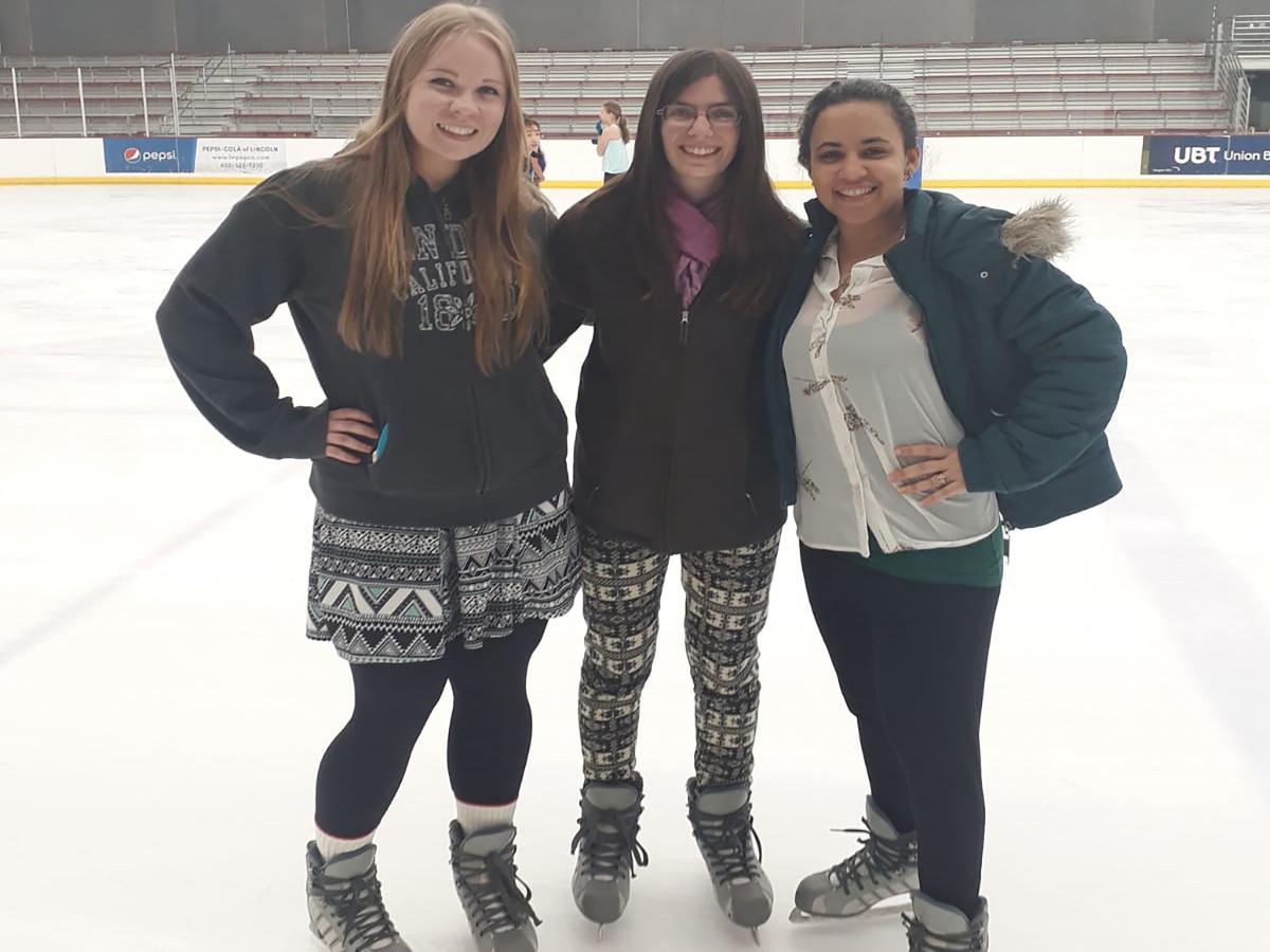 students on an ice skating rink